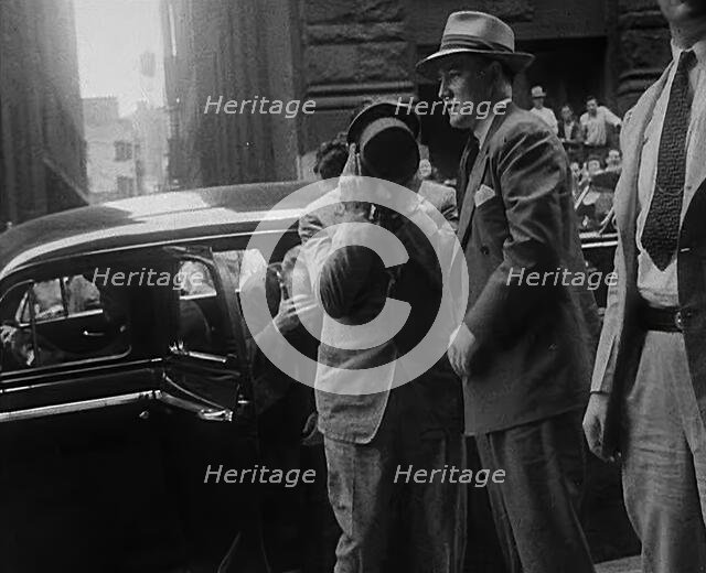 Suspected Agents Being Led to Trial, 1942. Creator: British Pathe Ltd.
