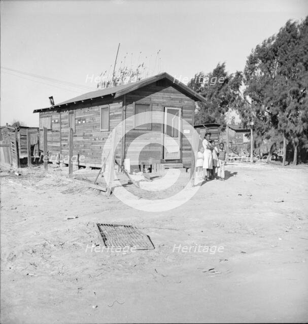 Housing for Negroes in a new district on the edge..., Bakersfield, Kern County, California, 1939. Creator: Dorothea Lange.