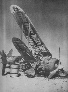 'Crashed in the Regia Aeronautica's Graveyard', 1941.  Artist: Unknown.