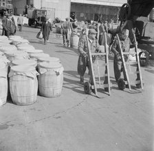 Dock scene, Fulton fish market, New York, 1943. Creator: Gordon Parks.