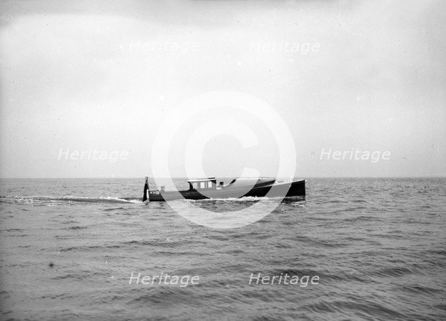 Wolseley motor launch under way, 1913. Creator: Kirk & Sons of Cowes.
