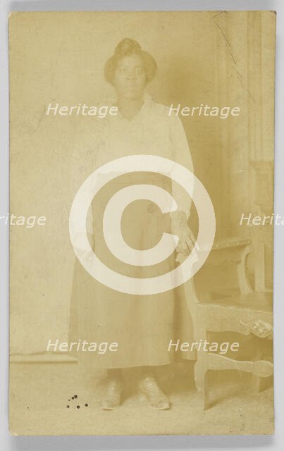 Photographic postcard of a woman, 1918-1930. Creator: Unknown.