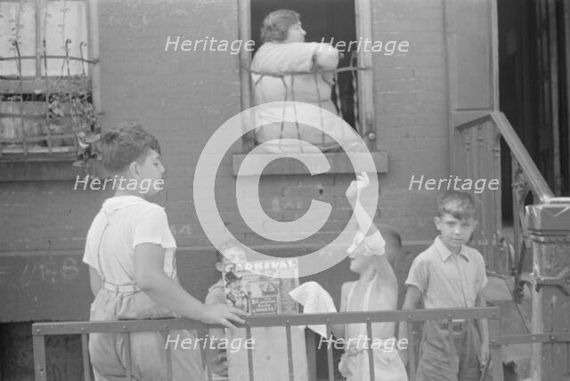 Children playing in the street, 61st Street between 1st and 3rd Avenues, New York, 1938. Creator: Walker Evans.