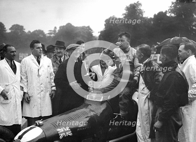 Bert Hadley and his winning Austin car, Imperial Trophy, Crystal Palace, 1939. Artist: Bill Brunell.