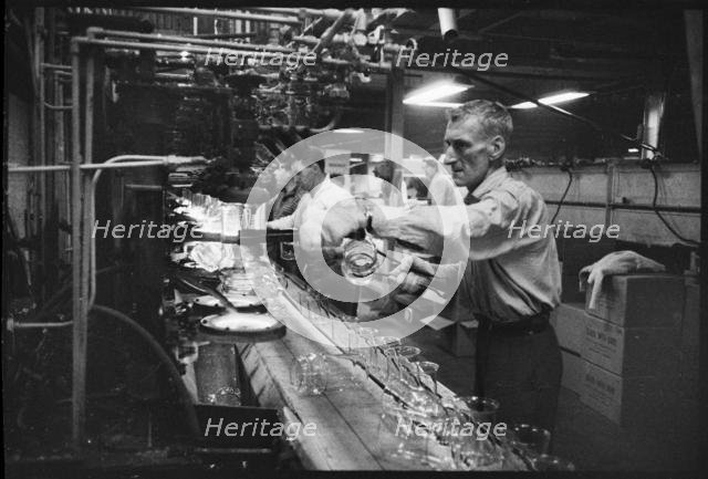 Worker at Wear Flint Glass Works, Alfred Street, Millfield, Sunderland, 1961. Creator: Eileen Deste.