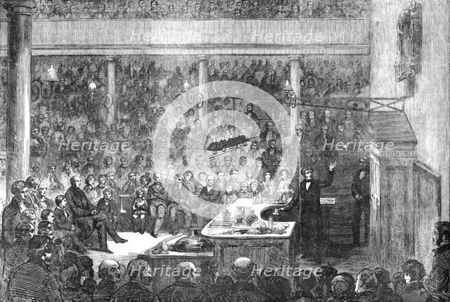 Professor Faraday lecturing at the Royal Institution, before H.R.H. Prince Albert, the Prince of Wal Creator: Unknown.
