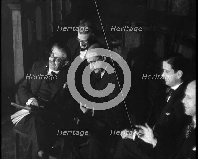 Men Listening to Beniamino Gigli Singing 'Largo' by Handel, 1930s. Creator: British Pathe Ltd.