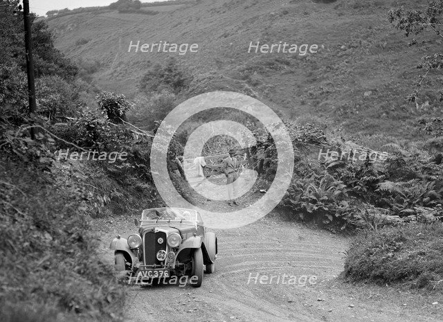 1935 Triumph Gloria Southern Cross taking part in a motoring trial in Devon, late 1930s. Artist: Bill Brunell.