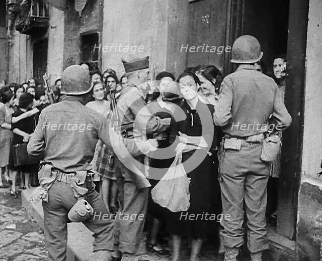 Italian Civilians Queuing for Food, 1943-1944. Creator: British Pathe Ltd.