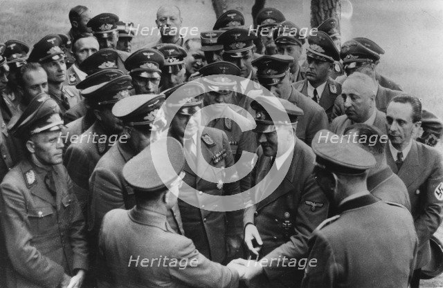 Adolf Hitler meeting with senior Nazis, Germany, August 1944. Artist: Unknown