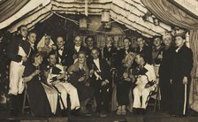 German actors, some in drag, gather on stage at a party, 1930-45. Creator: Unknown.