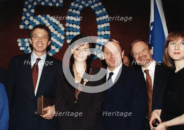 Robin Cook (1946- ), Tony Blair (1953- ) and Cherie Blair at a ceremony, 1998. Artist: Sidney Harris
