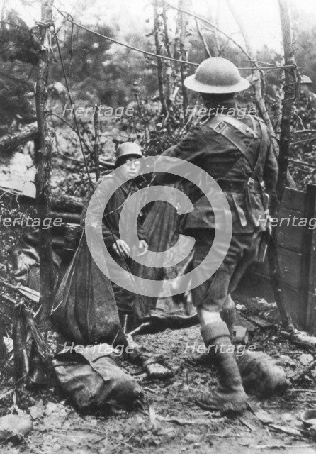 A German soldier surrenders, Aisne, France, World War I, 18 July 1918. Artist: Unknown