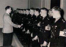 Nazi Deputy Führer Rudolf Hess meeting members of the Hitler Youth, Germany, January 1939. Artist: Unknown
