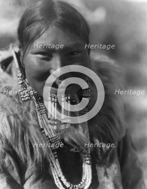 Kenowun-Nunivak, c1929. Creator: Edward Sheriff Curtis.