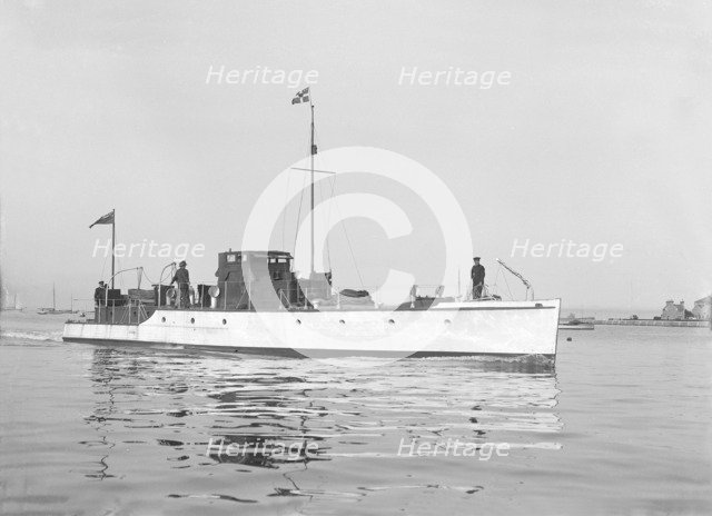 Motor yacht 'Amo' under way, 1921. Creator: Kirk & Sons of Cowes.
