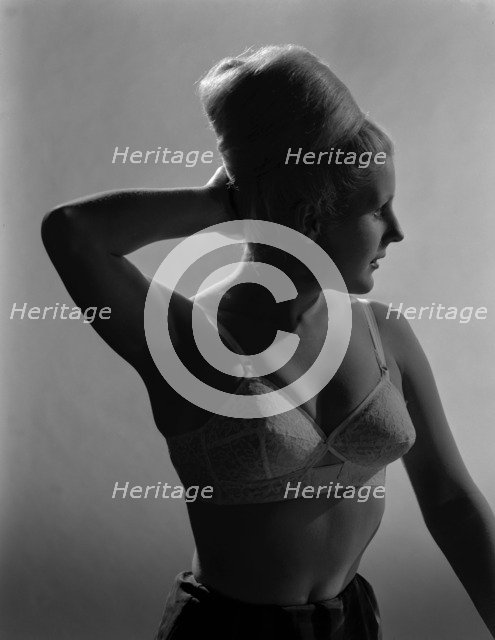 Advertising image for Truline bras, 1963.  Artist: Michael Walters