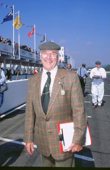 Commentator Murray Walker at 1998 Goodwood revival. Artist: Unknown.