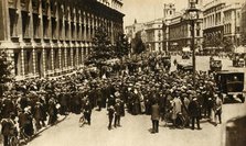 Crowds waiting outside Downing Street in London for news about...war, July 1914, (1933).  Creator: Unknown.
