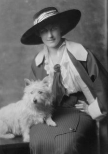 Milholland, Inez (Mrs. Eugene Boissevain), with dog, portrait photograph, 1914. Creator: Arnold Genthe.