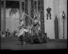 Scene from a Stage Show: Male and Female Civilian Dancing on a Stage in a Routine with..., 1929. Creator: British Pathe Ltd.