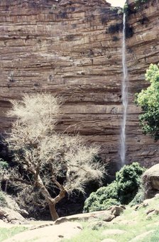 Waterfall before rain, Bandiagara Escarpment, Pays Dogon, Mali, 1990. Creator: Amanda Waite.