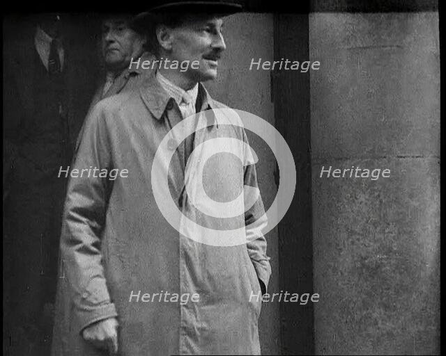 Clement Attlee Standing Outside a Building, 1930s. Creator: British Pathe Ltd.
