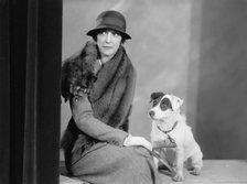 Foote, Walter A., Mrs. Portrait. with Dog, 1933. Creator: Harris & Ewing.