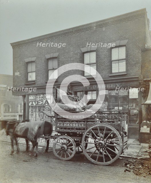 Horse and cart with sacks of vegetables, Bow, London, 1900. Artist: Unknown.