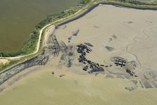 A dismantled WW2 Maunsell anti-aircraft fort, Higham Creek, Medway, 2024. Creator: Damian Grady.