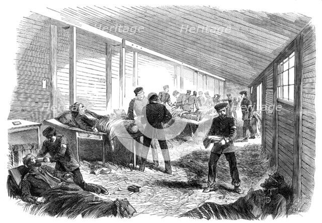 The War in Denmark: temporary field hospital...scene in the amputating hut..., 1864. Creator: Unknown.
