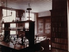 The interior of a pharmaceutical or chemical laboratory with a bench..., c1890s. Creator: Unknown.