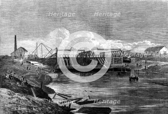 The Inundation in the Fens: the syphon dam of the middle-level drain, 1862. Creator: Unknown.