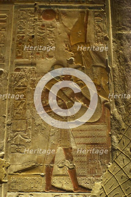 The Pharaoh being breastfed, Temple of Seti I, Abydos, Egypt, New Kingdom, 19th Dynasty (2003). Creator: LTL.