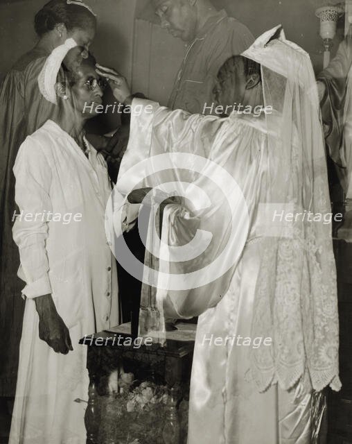 Saturday afternoon, 7th Street and Florida Avenue, N.W., Washington, D.C., 1942. Creator: Gordon Parks.
