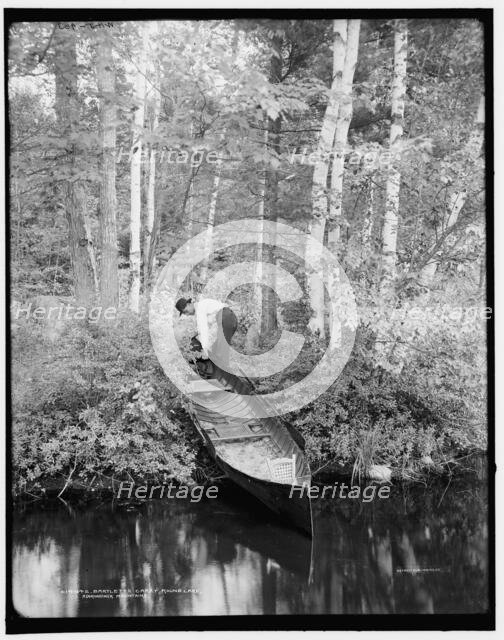 Bartlett's carry, Round Lake, Adirondack Mountains, (1902?). Creator: William H. Jackson.