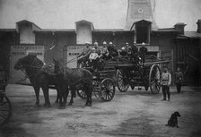 Horse-Drawn Departure of a Fire Ladder, early 20th century. Creator: Unknown.