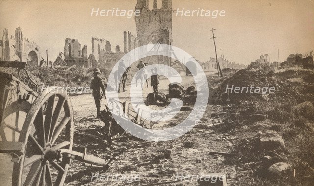 'The battered remains of Ypres after the last shell had done its worst, showing the ruins of the fam Artist: Unknown.