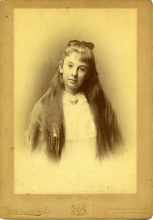 Portrait photography of an unknown teenage girl with beautiful long hair. Creator: Unknown.