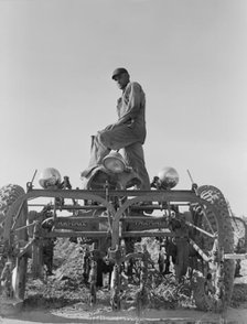 Tractor on Lake Dick project, Arkansas, 1938. Creator: Dorothea Lange.