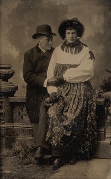 Two Men, One Dressed in Women's Attire, Holding Hands, 1870s-80s. Creator: Unknown.