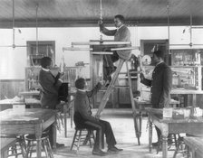 Hampton Institute, Va. 1899 - Classroom scenes - testing combined draught of animals, 1899 or 1900. Creator: Frances Benjamin Johnston.