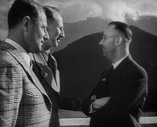 Heinrich Himmler Talking to Two Other Men, 1942. Creator: British Pathe Ltd.