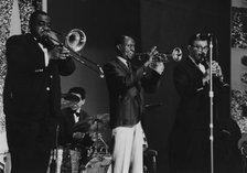 Louis Armstrong and All Stars on stage, Hammersmith Odeon, London, 1968. Creator: Brian Foskett.