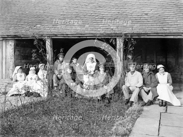 Soldiers and nurses at Great Dixter, Northiam, East Sussex, WWI, 1916. Artist: Nathaniel Lloyd