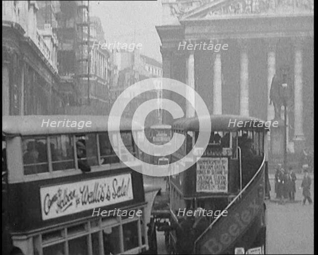 Buses Driving in Busy London Streets, 1929. Creator: British Pathe Ltd.