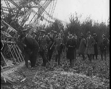 Chief Marshal Sir John Salmond and Other British Officials Walking Around the Wreckage..., 1930. Creator: British Pathe Ltd.