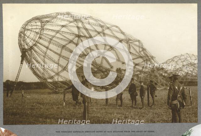 The wrecked Zeppelin brought down by our aviators near the coast of Essex, 1915. (1921). Creator: HD Girdwood.