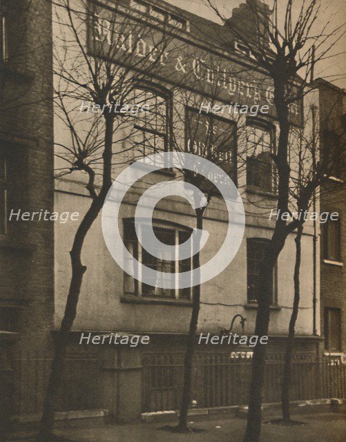 'At the Sign of the Old Bell in St. Bride's Churchyard', c1935. Creator: Walter Benington.
