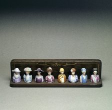 Figurines depicting lady golfers, early 20th century. Artist: Unknown
